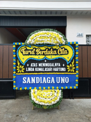 Papan Bunga Duka di Dau